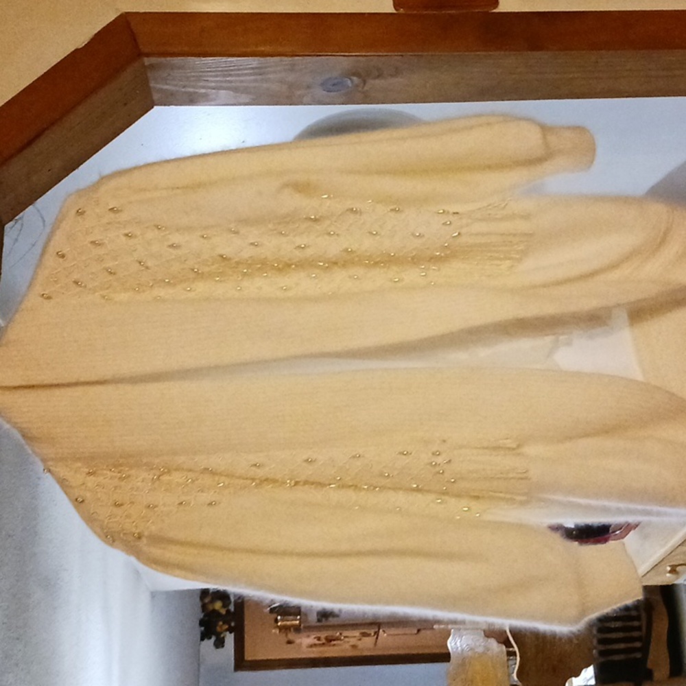 White sweater with pearls